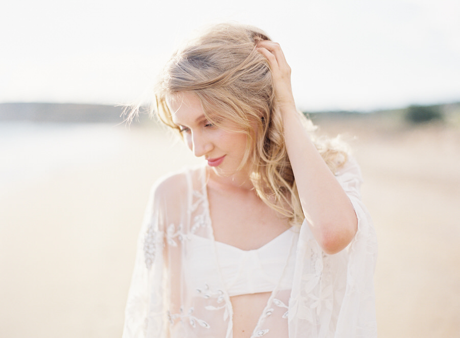 Greece destination wedding or greece honeymoon | A white swim coverup and lace gown | Les Anagnou Photographers