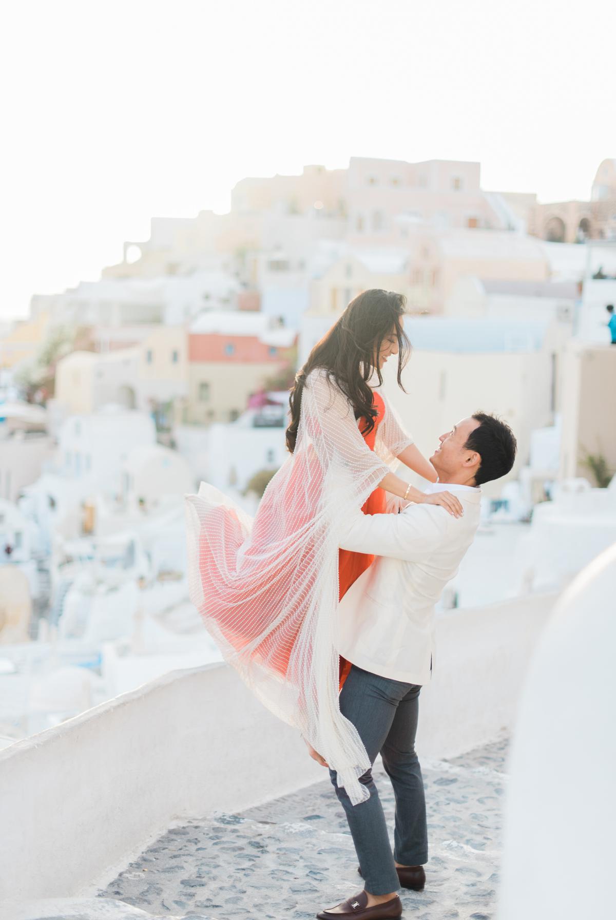 Happiness during engagement session in Santorini