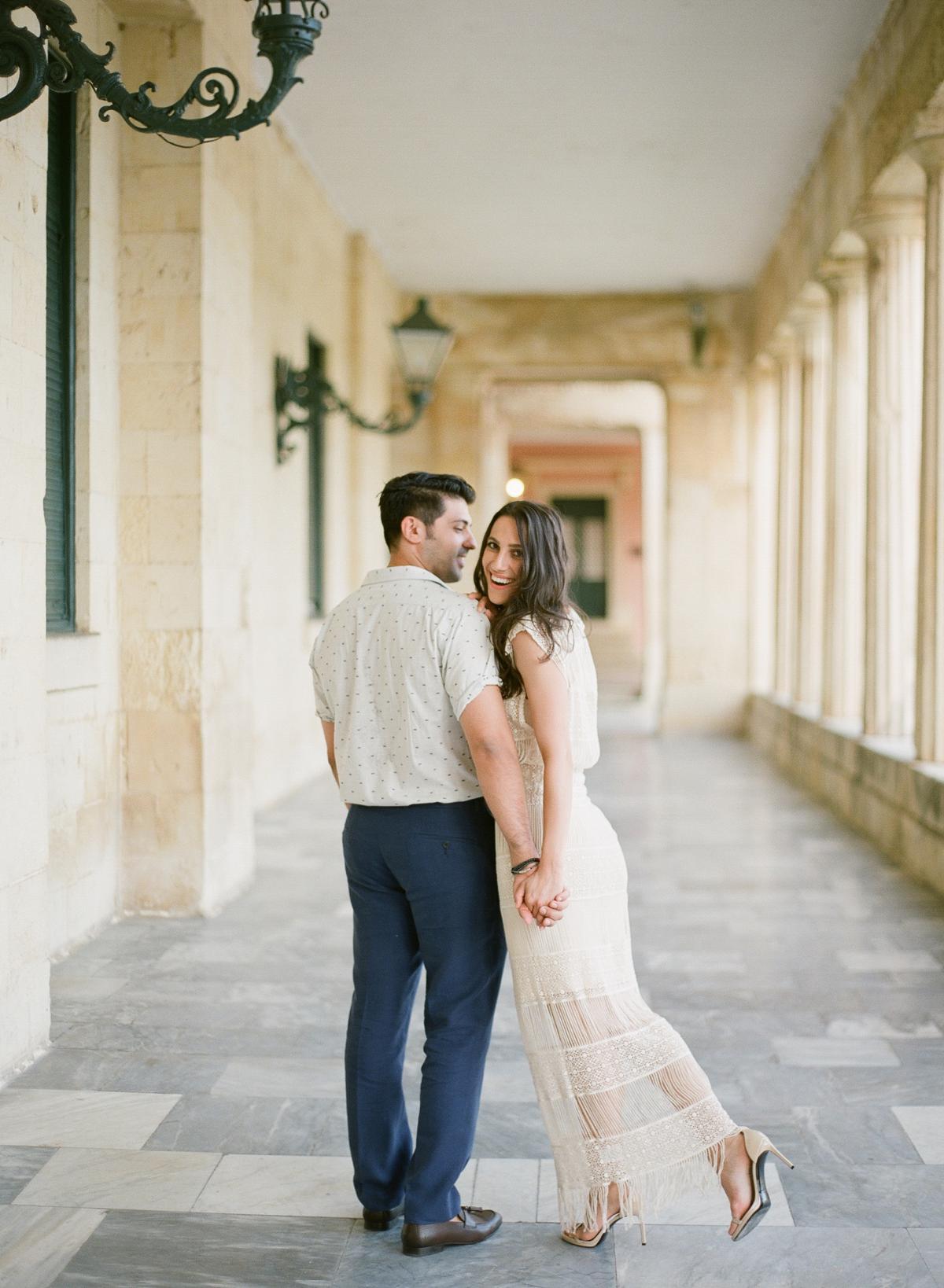 happy couple during engagement session in Corfu