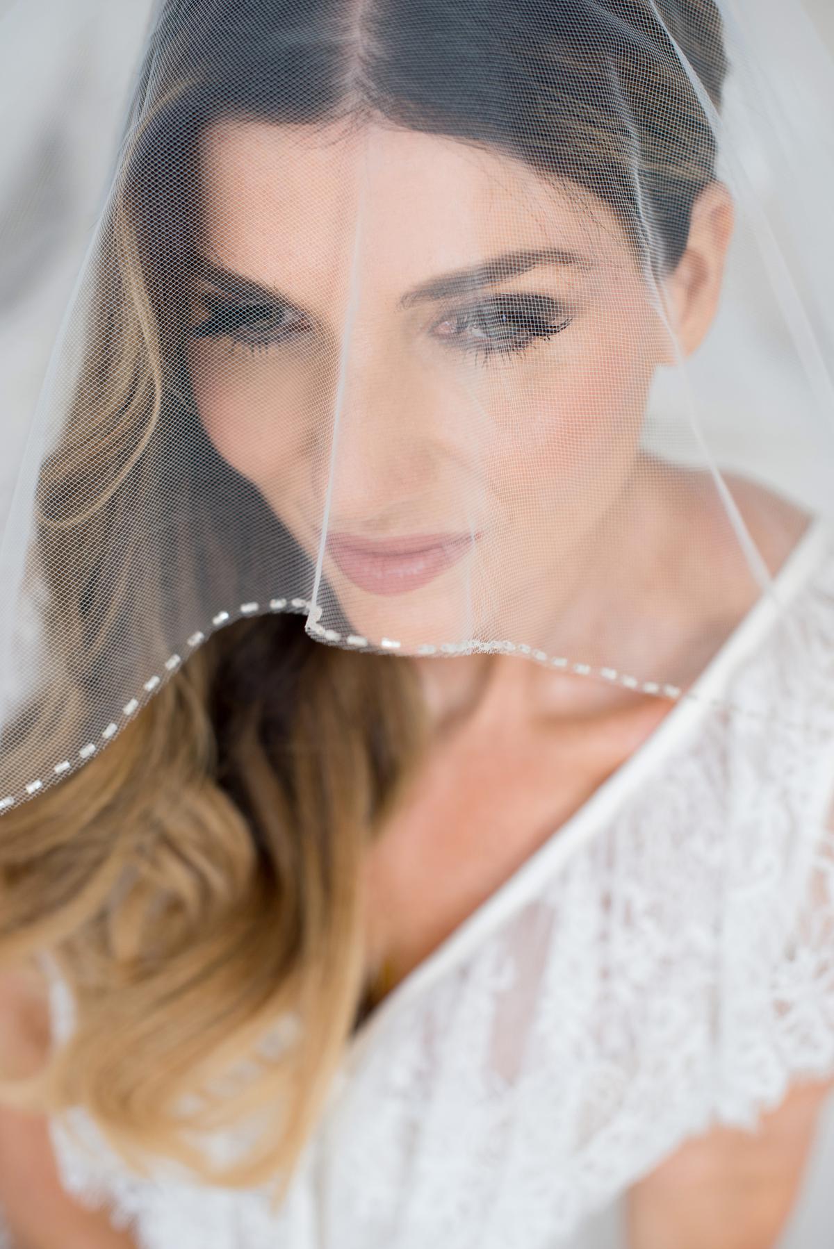 bridal portrait during boudoir session in Santorini Greece