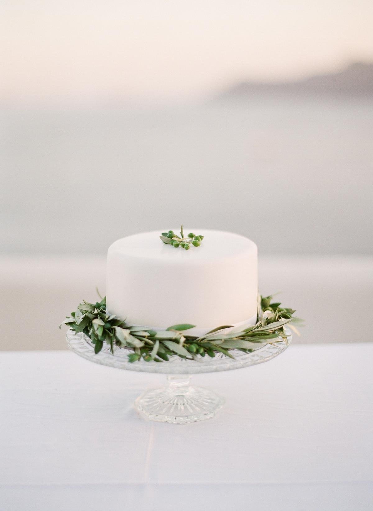 cake during elopement in Santorini