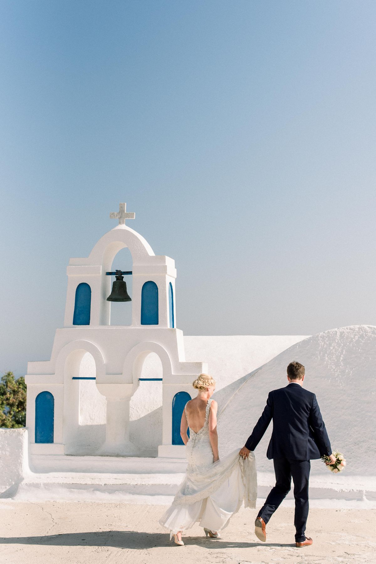 bride and groom portrait session in Santorini real wedding