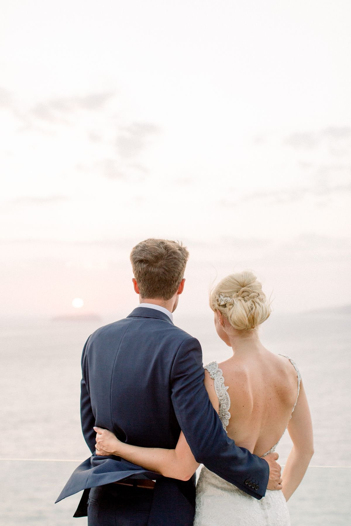 bride and groom sunset portrait session in Santorini real wedding