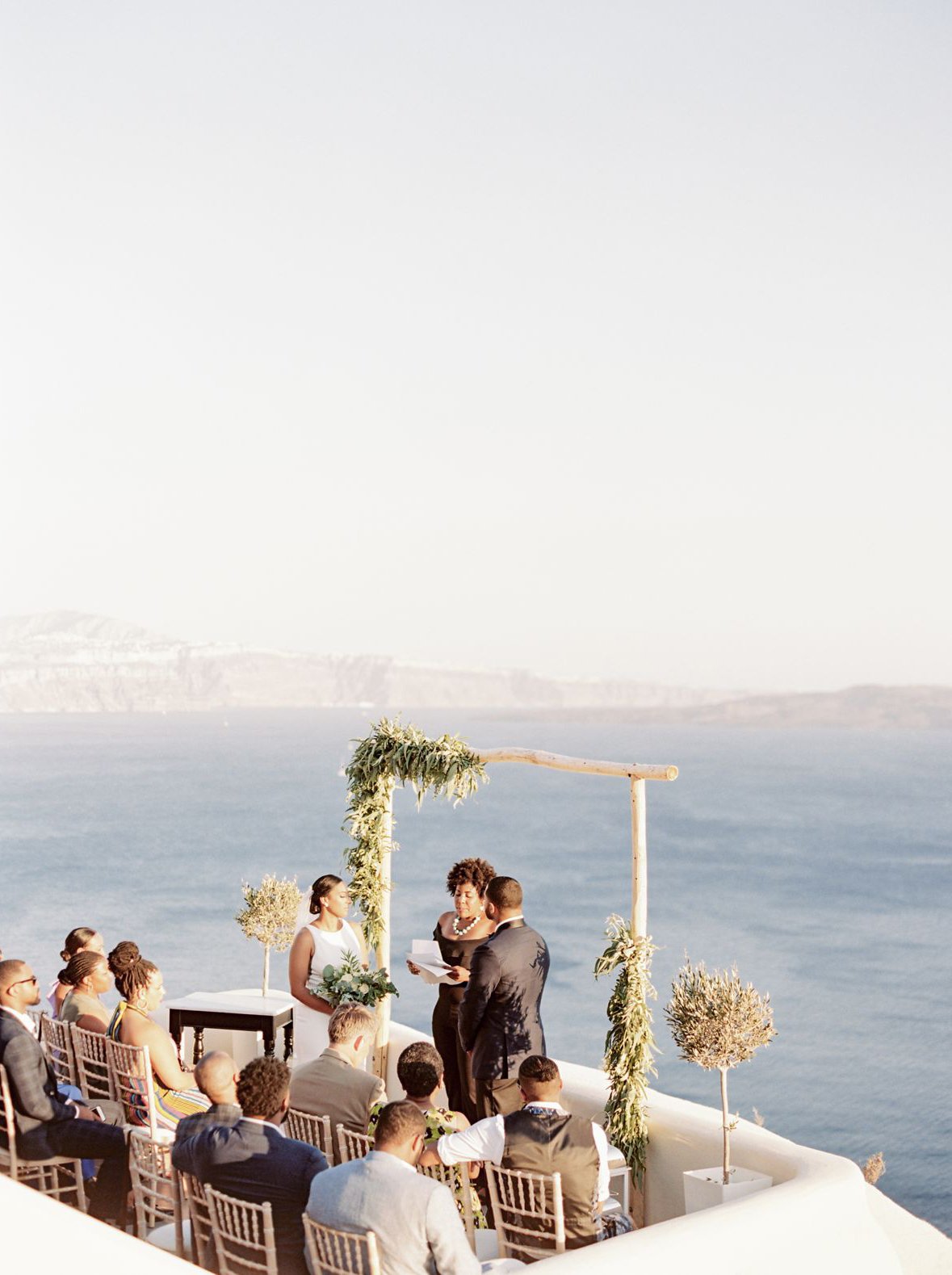 Wedding ceremony for elopement at Canaves Oia, Santorini