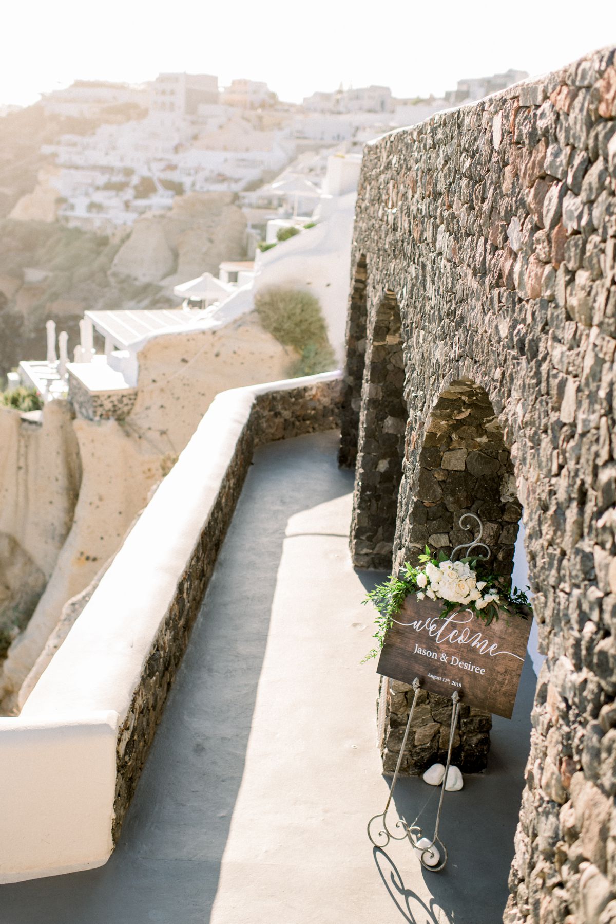 Ceremony for intimate wedding at Canaves Oia, Santorini