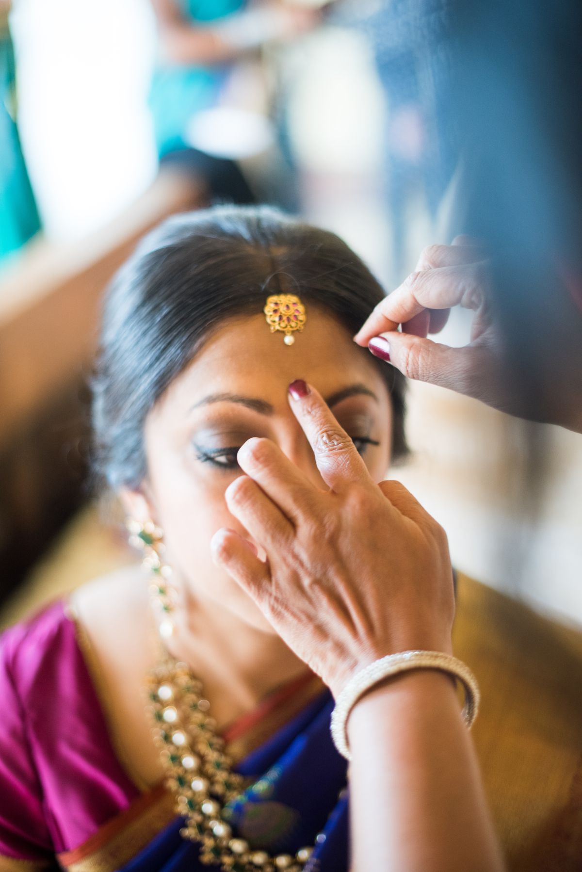 bride getting ready at hindu wedding in greece