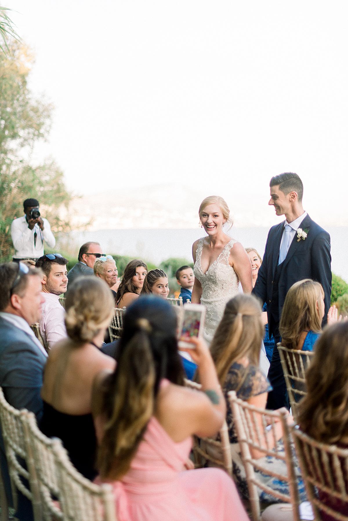 Bride and groom at ceremony private island house athens