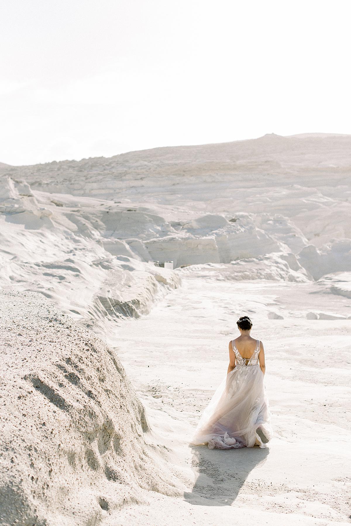 Bride during her first look session in Milos island Greece