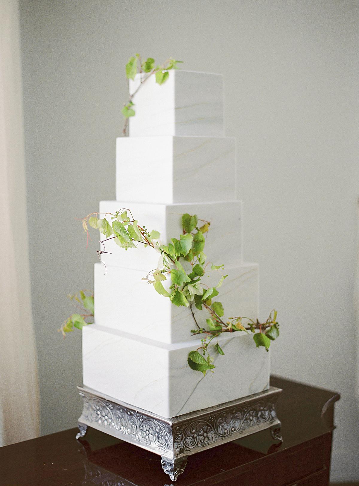 five tier wedding cake in white for a destination wedding in spetses island greece