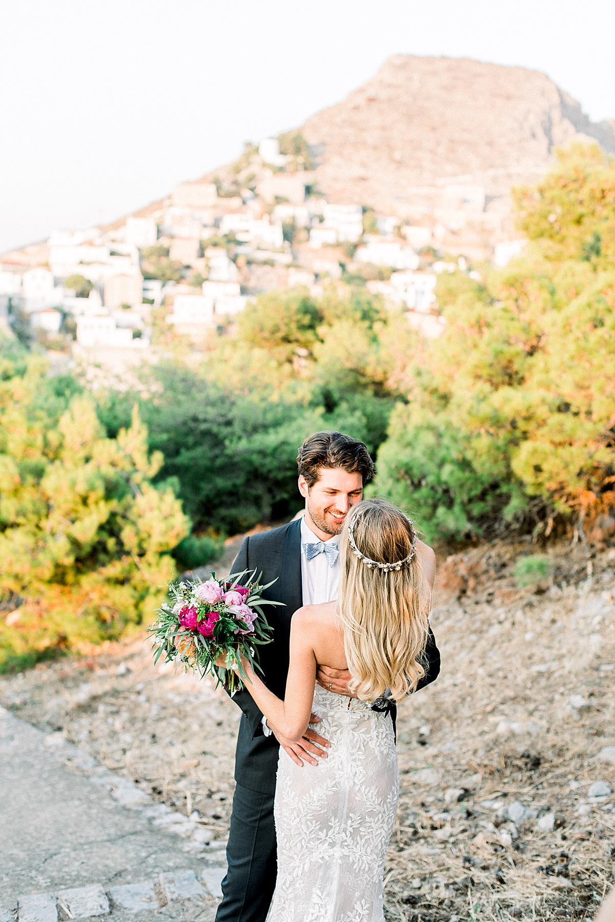 bride and groom during portrait session on Hydra island_3