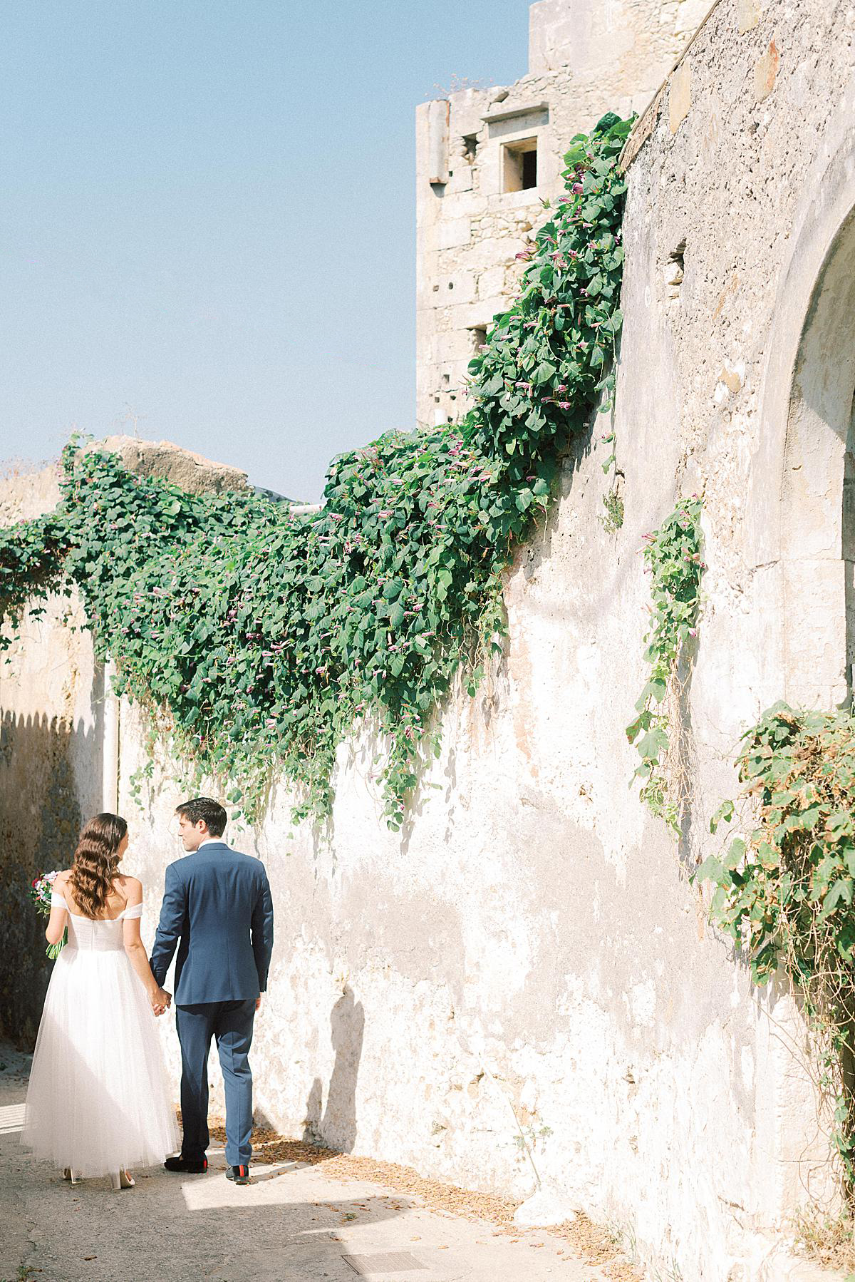 bride and groom portrait session at a wedding in crete as seen on Style Me Pretty