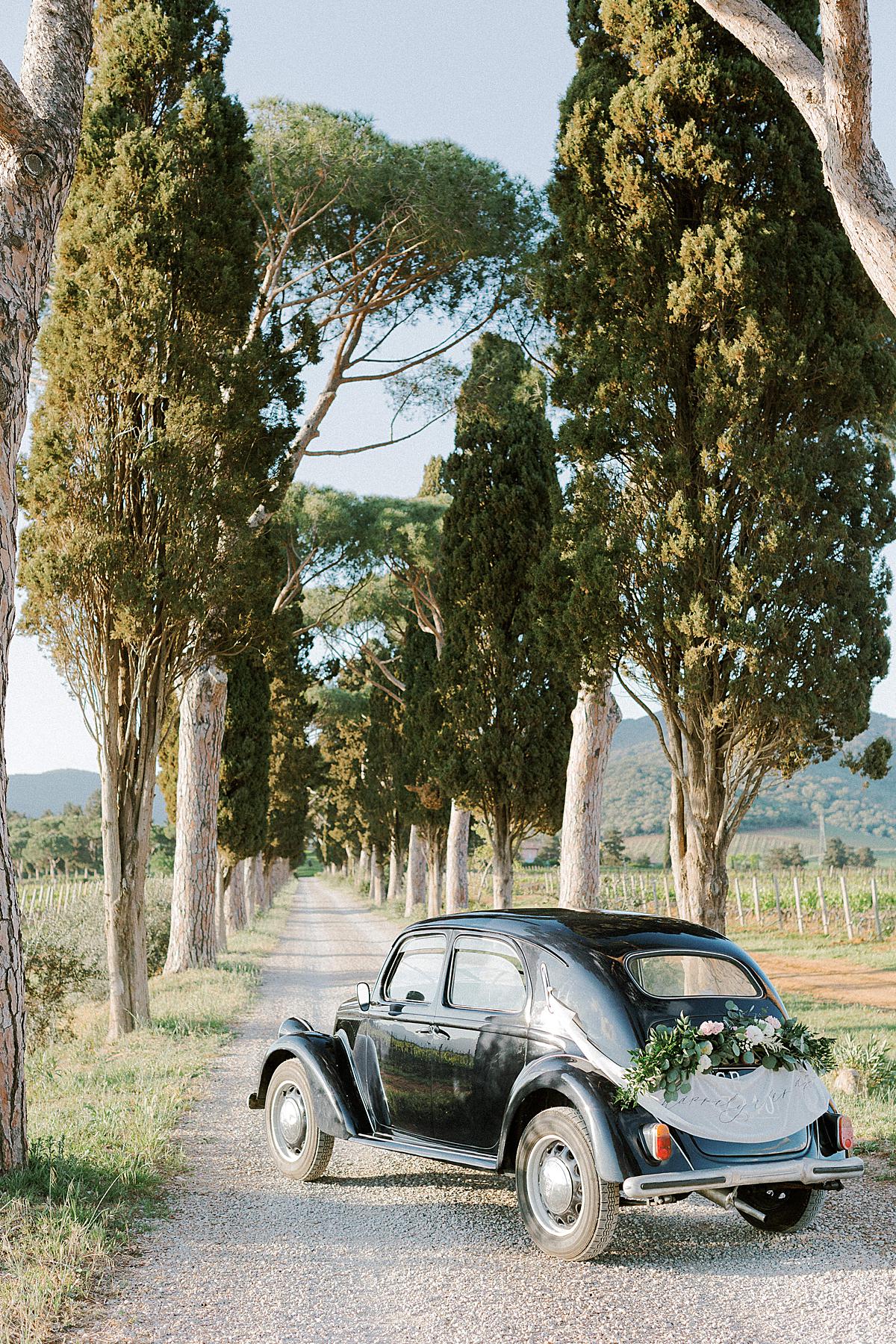 vintage car at tuscany wedding