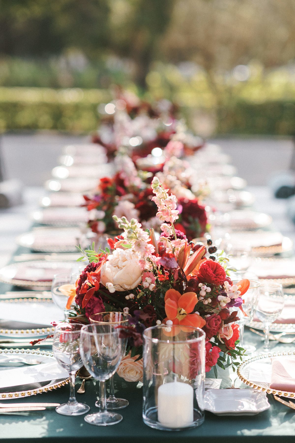 red and teracota wedding table centerpieces