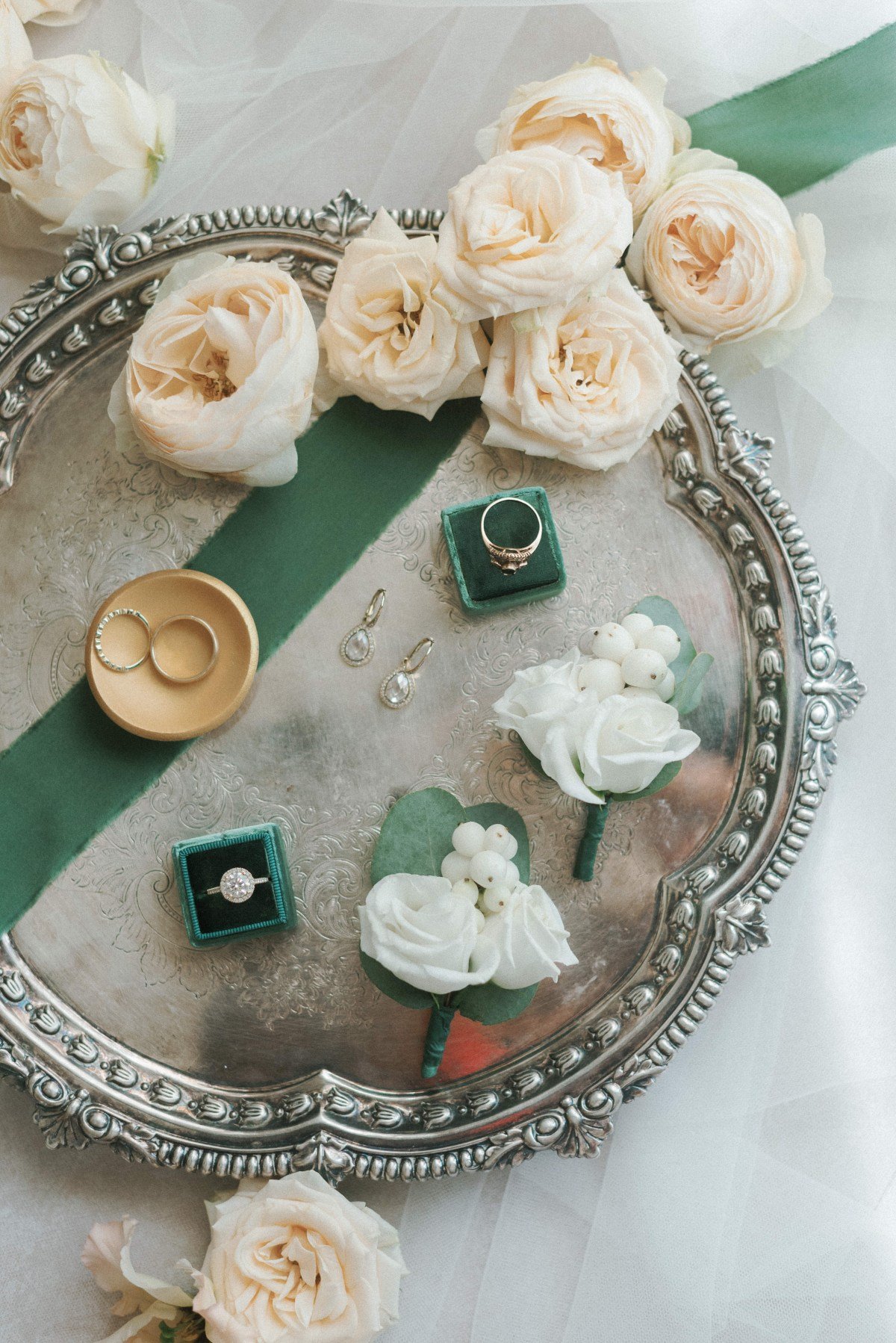 wedding photography detail shot with roses and silk ribbons