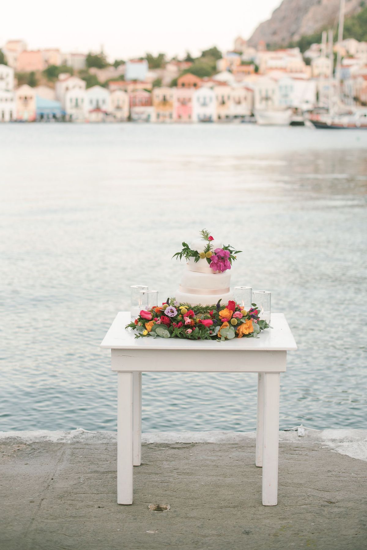 wedding cake with colourdul flowers - destination wedding in kastelorizo